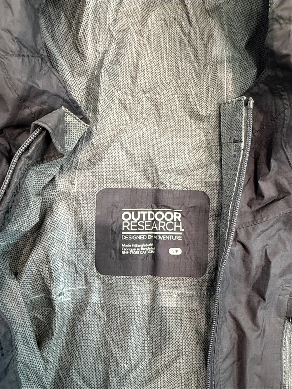 Outdoor Research Black Hooded Packable Rain Shell. Rain jacket. Size small